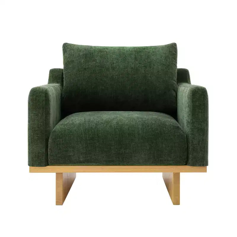 Poltrona moderna Niran in legno di gomma con rivestimento in bouclé e morbido cuscino