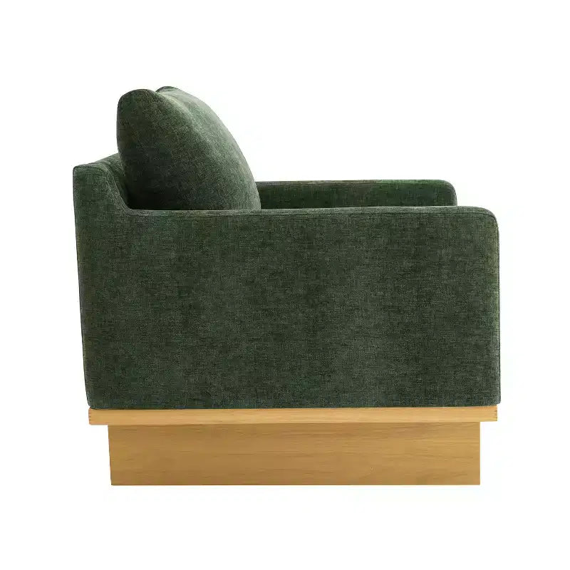 Poltrona moderna Niran in legno di gomma con rivestimento in bouclé e morbido cuscino