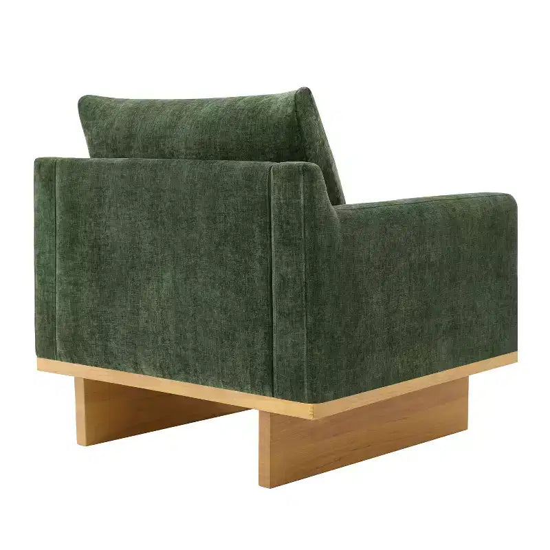 Poltrona moderna Niran in legno di gomma con rivestimento in bouclé e morbido cuscino
